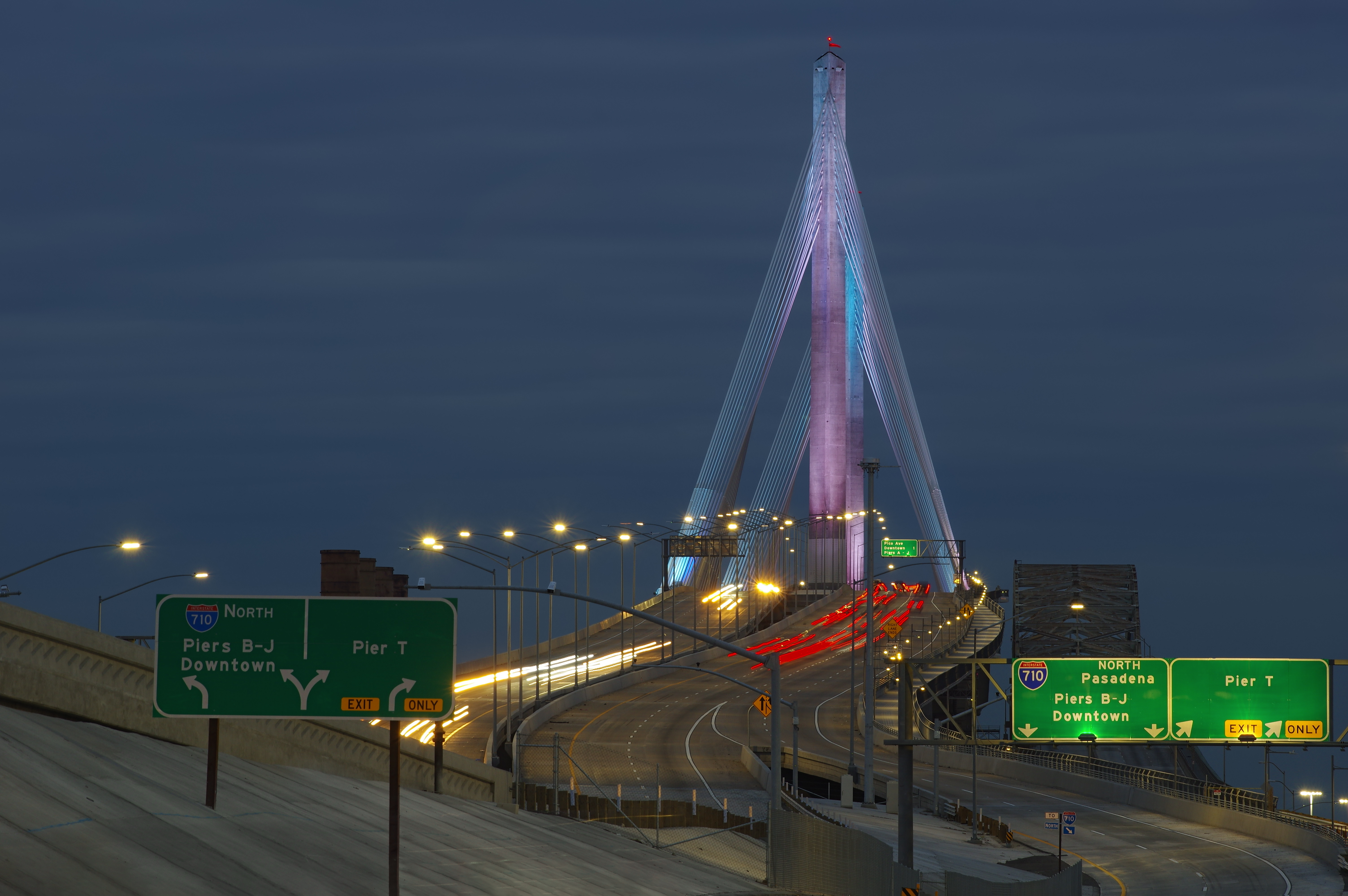 Long Beach, California, USA - January 31, 2021: this image shows a 2.5-sec exposure of the new Gerald Desmond Bridge taken at dusk.